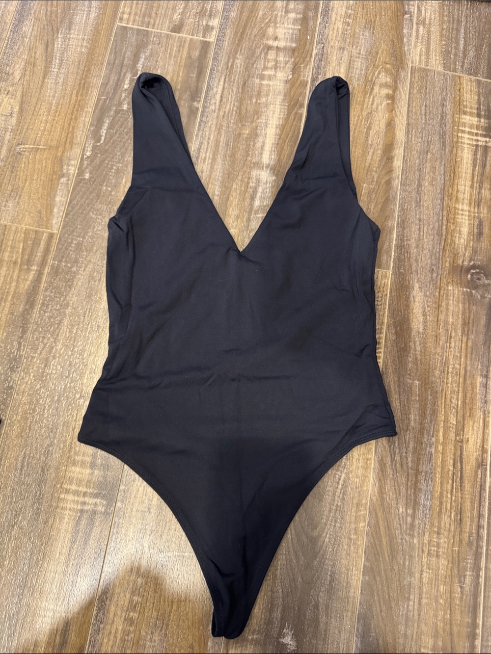 Babaton Black V-Neck One-Piece Bodysuit